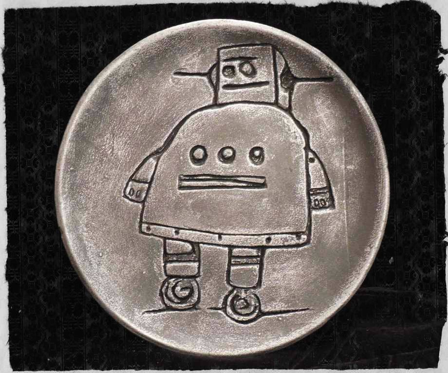 Vinegar Etching (The Instructables Robot in Clay)