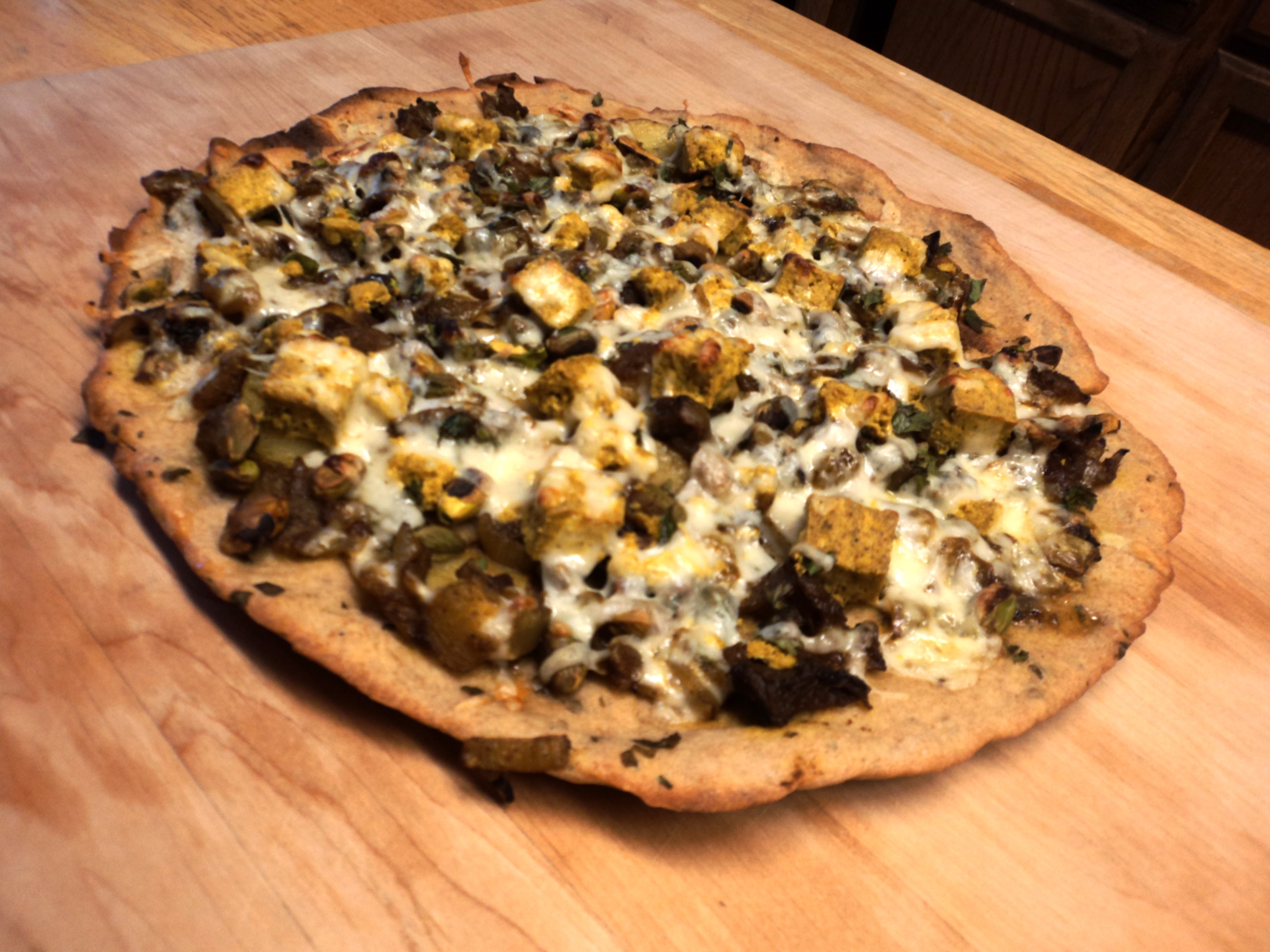 How to Make Indian Pizza With Caramelized Onions, Potatoes, and Pistachios