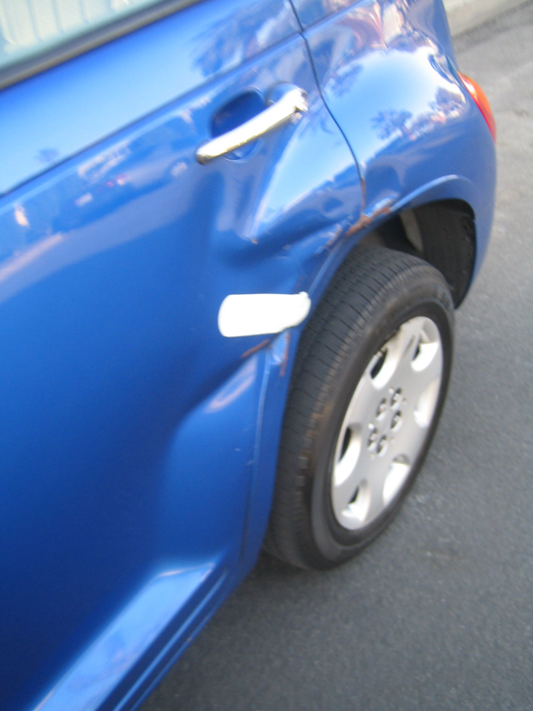 Pull a Car Dent Using a Telephone Pole