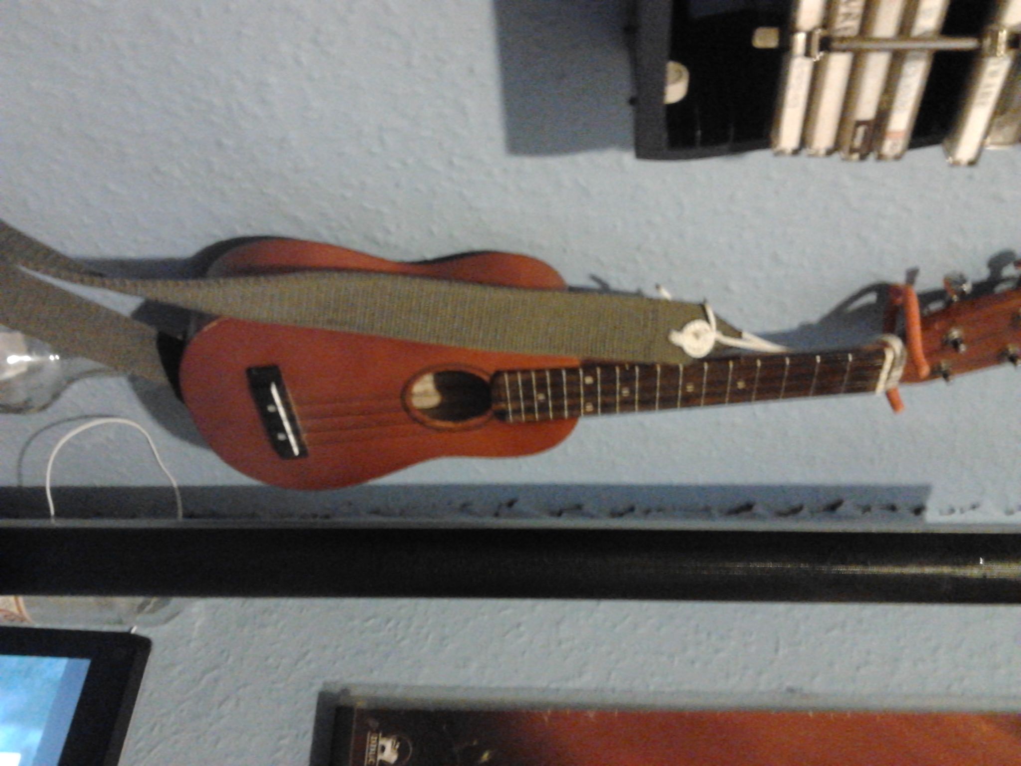 Fit Guitar Strap End Pin Buttons and Gutar Style Strap to a Ukelele.