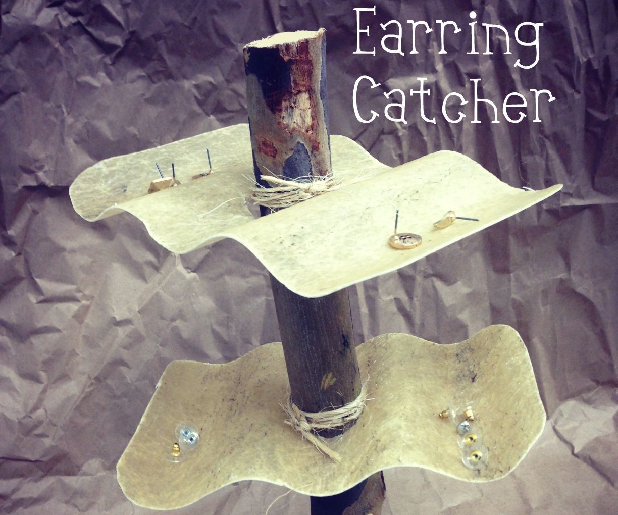 Found object earring catcher