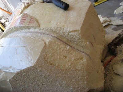 Hot Wire, Carve, and Shave Your Foam Block Down to a Curved Form.