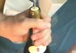 Open a bottle of wine without a corkscrew