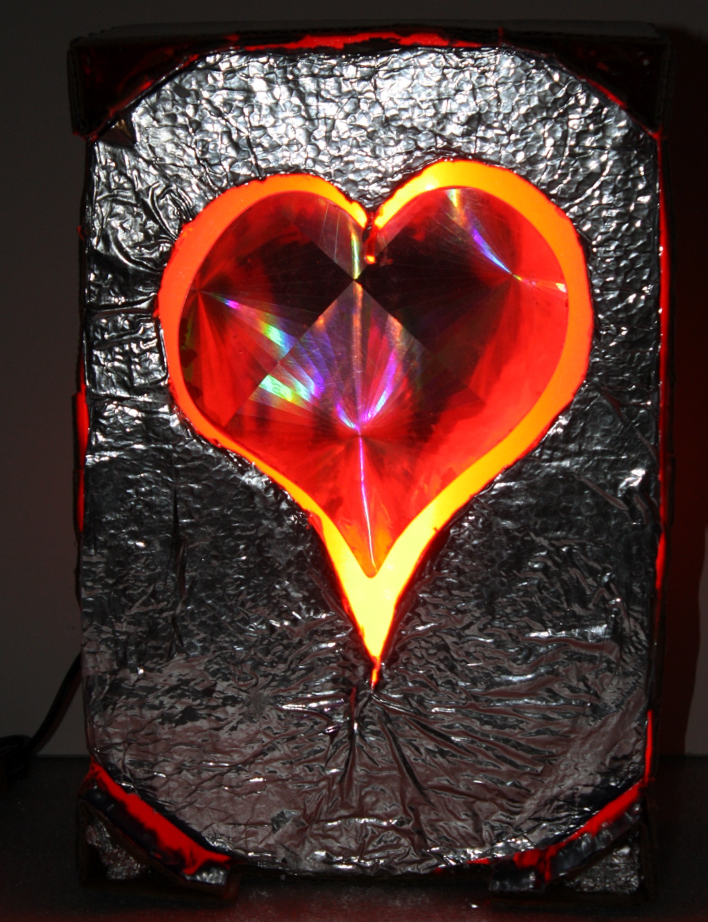 A Bright Glowing Heart Floating in a Box for a Cutie