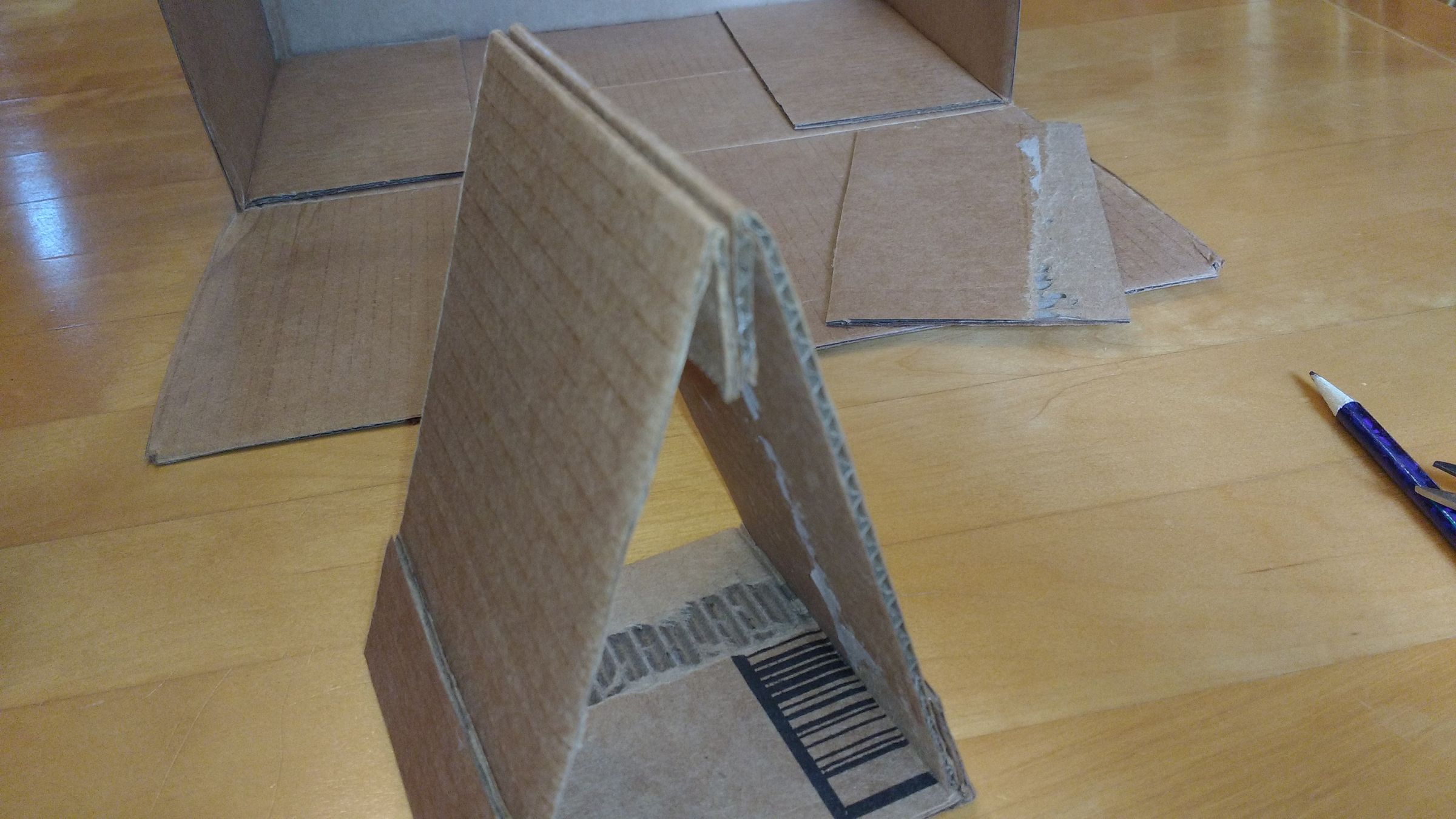 Make a Free/Inexpensive Fishing Rod Wrapping Jig Out of a Cardboard Box ...