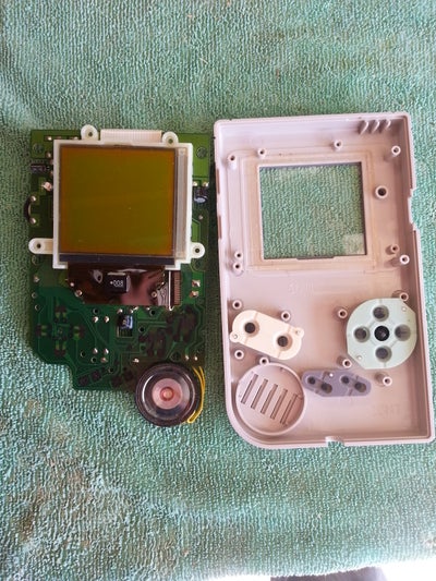 Dis-assembly of Holster, Game Boy, and Wiimote