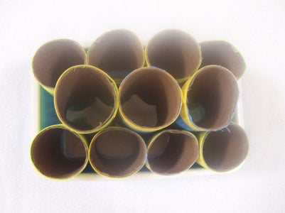 Position Tissue Rolls Inside the Wipe Box