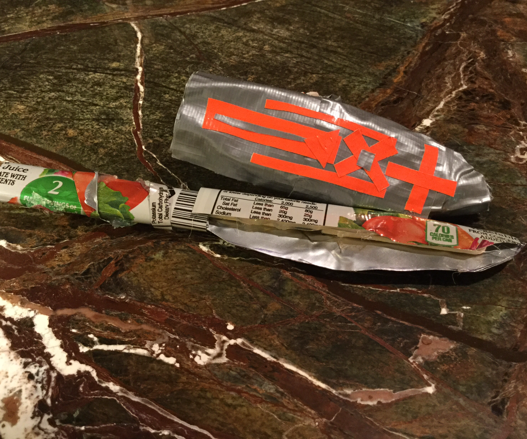 DIY Tin Can Knife Sheath Made With Ducttape