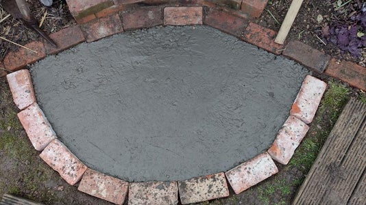 Laying the Crazed Terracotta Standing Area and Oven Surround