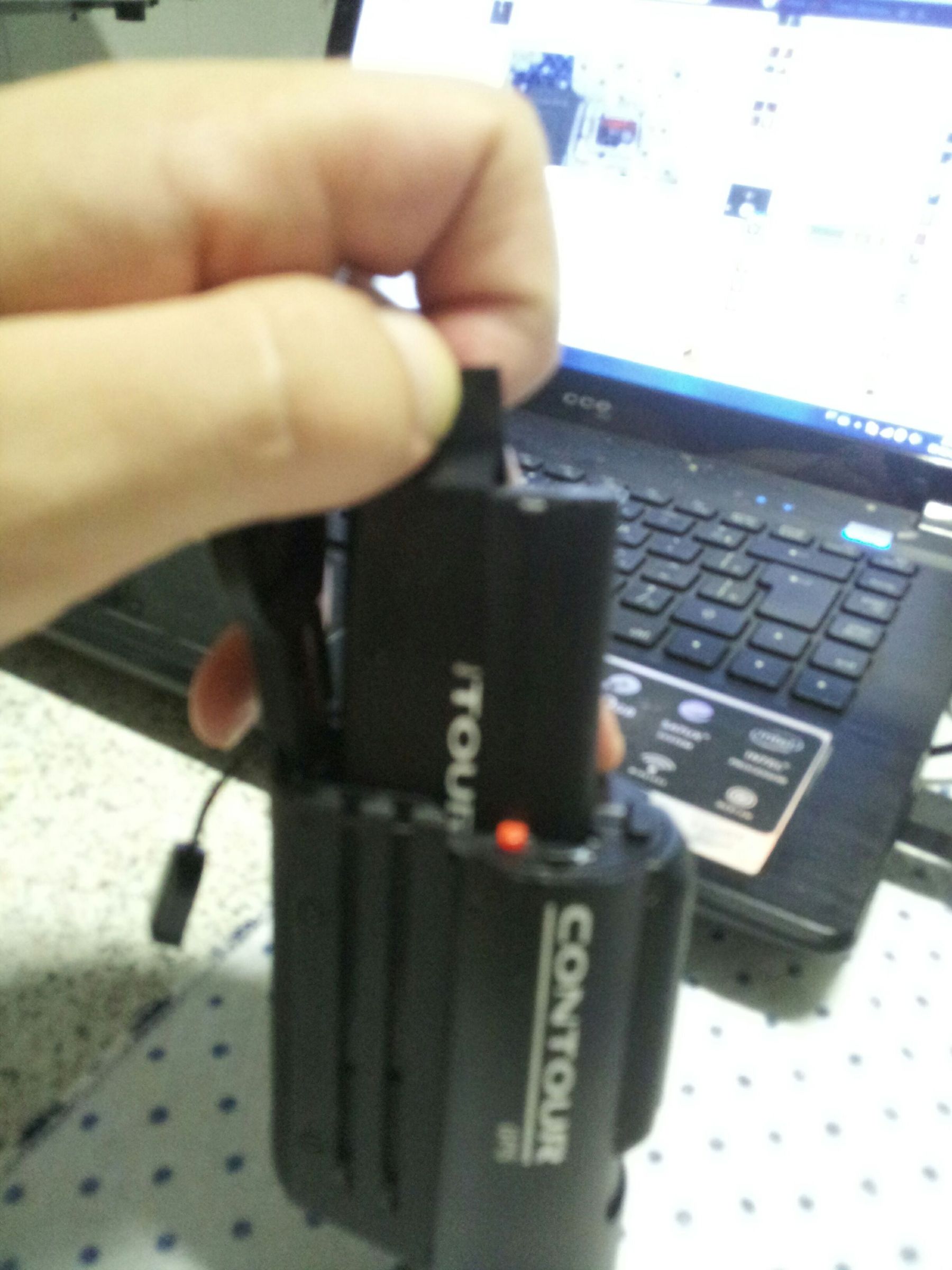 Contour GPS battery release camera