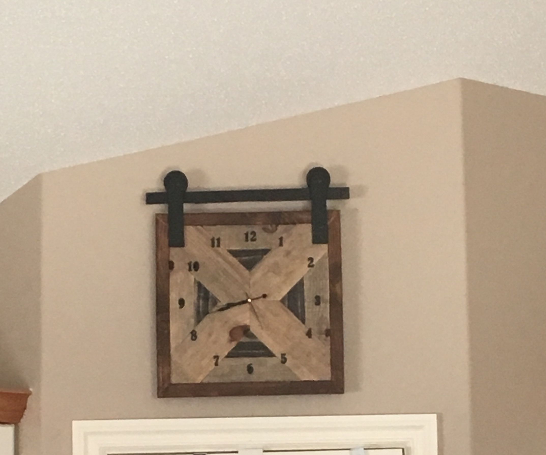 DIY Barn Door Styled Clock Made Out of Old Pallet Boards