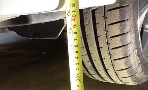 Loosen the Axle Nut and Jack Up the Car