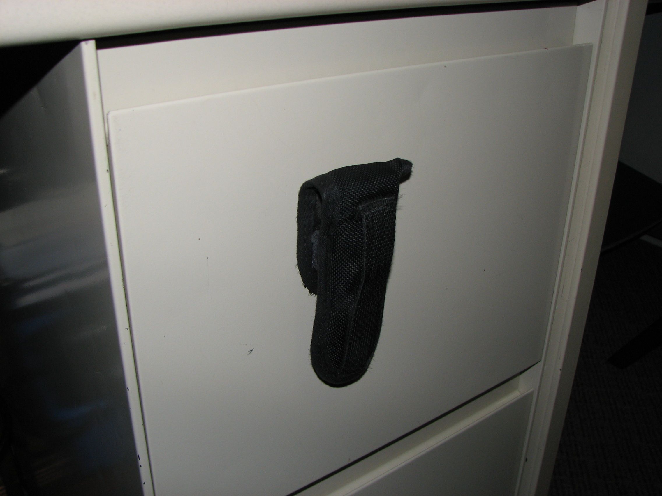 Magnetically Latching Multi-tool Holster