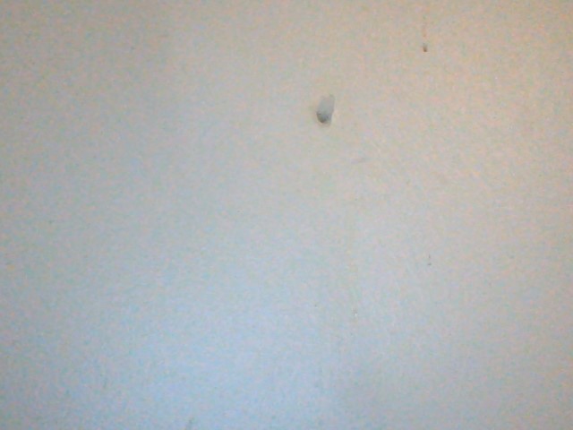 How to Fix a Chip or Small Hole in the Wall With Paper