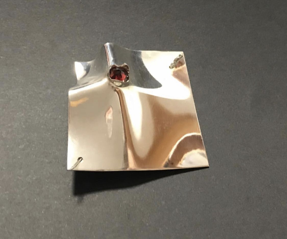 Punctured Brooch