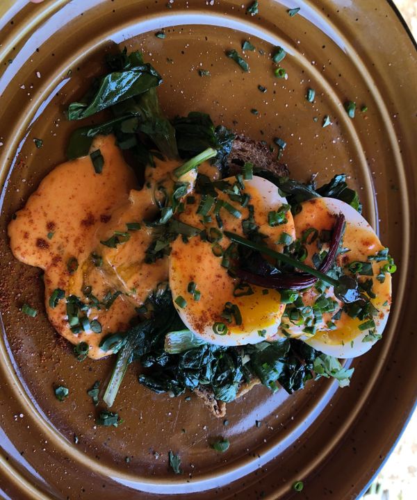 Soft Duck Eggs Benedict With Roasted Poblano Hollandaise and Wild Greens