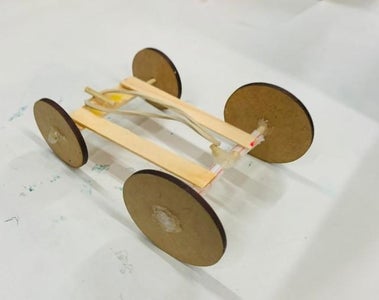 Carrinho De Elástico