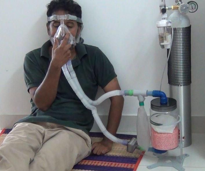 Rebreather for Achieving Oxygenation During Oxygen Shortage in COVID-19 Crisis