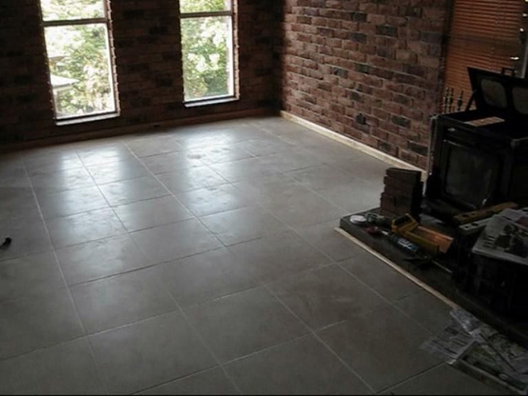 Cutting a Curve in a Ceramic Tile With an Angle Grinder