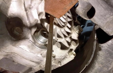 Drain Transmission, Disconnect Control Arms, and Remove Left Axle