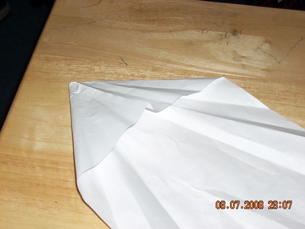 Toss It! Make a Cone Shaped Paper Airplane.