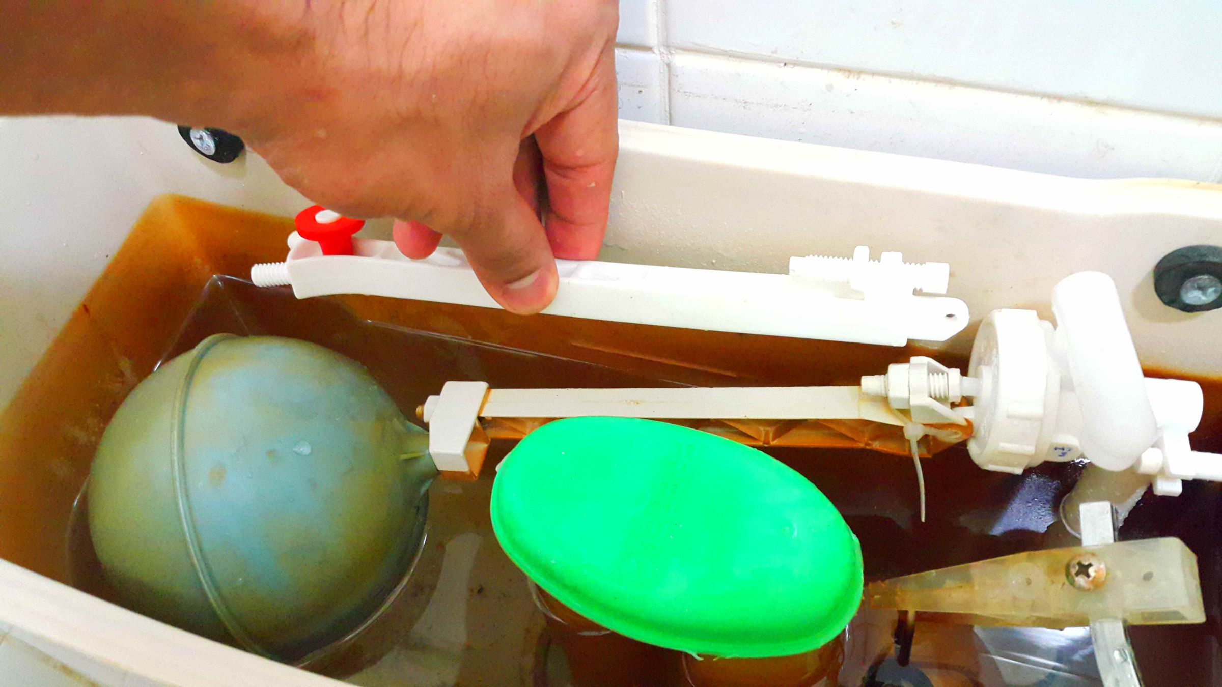 Replacing a Toilet Tank Float Valve. 6 Steps (with Pictures