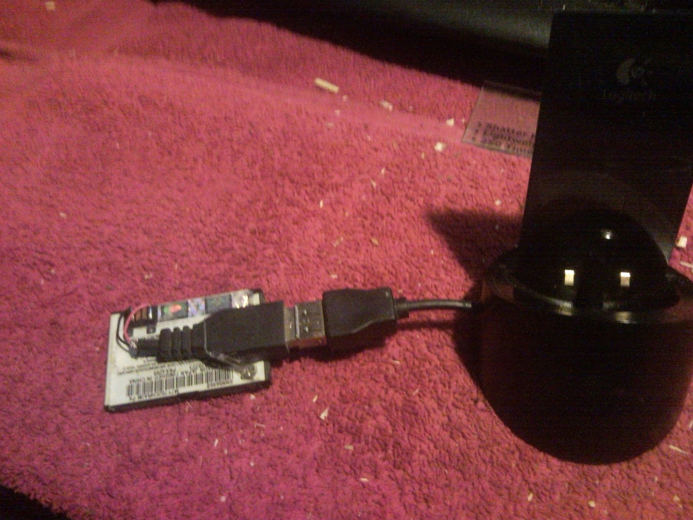 DIY USB Battery Charger for Cell Phone Lithium Ion Batteries From a Wireless Mouse Charger