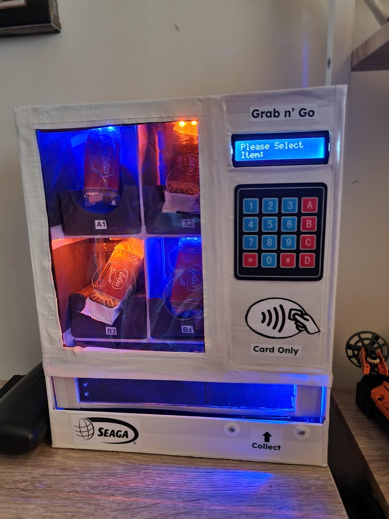 Craft Your Own Desktop-Sized Cardboard Vending Machine With an Arduino ...