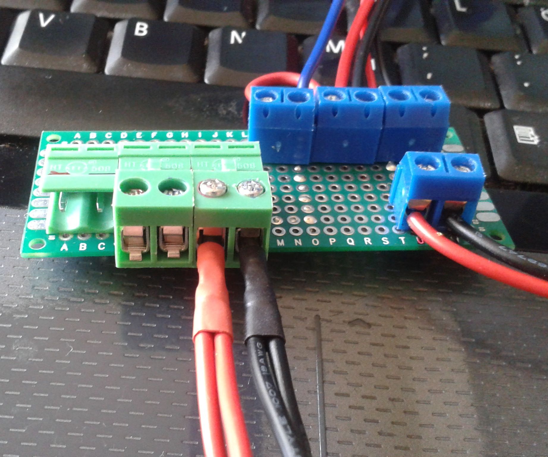 Low Voltage DC Power Distribution and Measurement Adapter