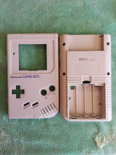 Dis-assembly of Holster, Game Boy, and Wiimote