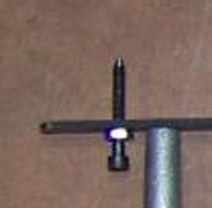 Drill  and Tap a Hole at One End for the Pointed Screw