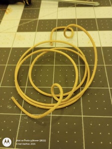 Uncurl Curling Leather Cords Using a Steamer