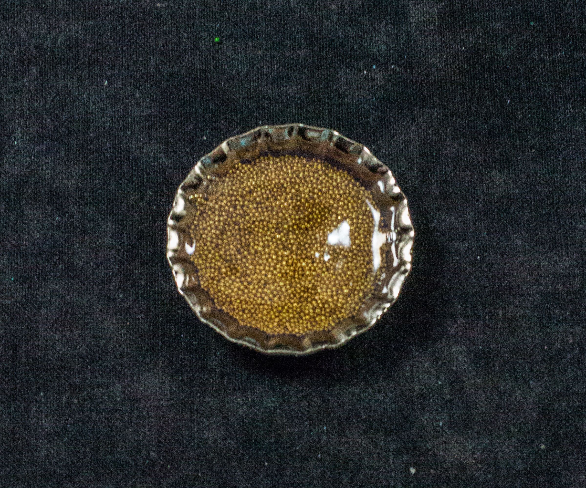 Making a Bottle Cap Necklace As Group Activity