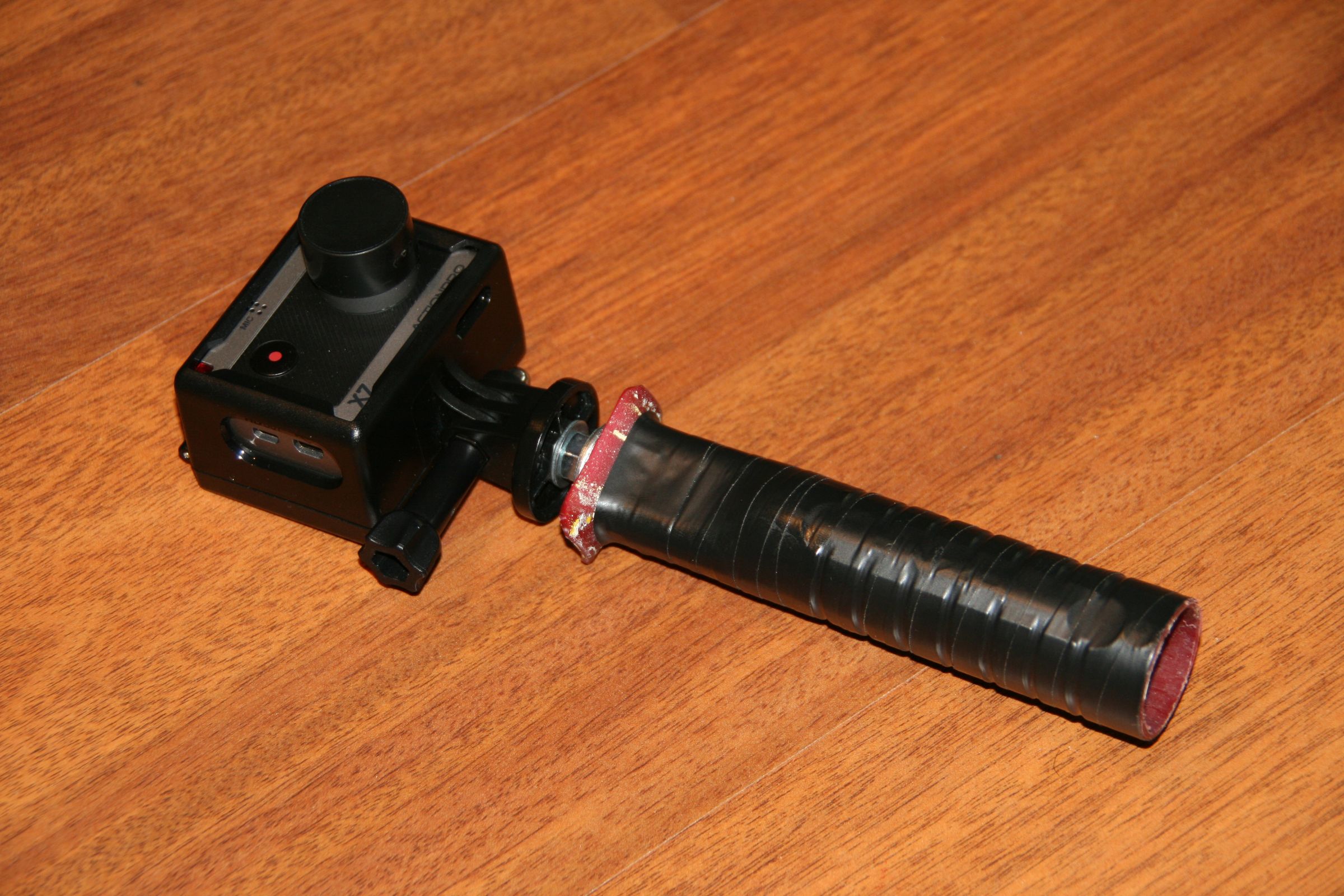 DIY Handle with Extension for GoPro, Actionpro X7 or any other action camera.
