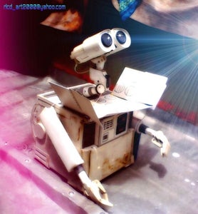 Join Head, Body and Hand Than Put a Some  Motor and Electronic