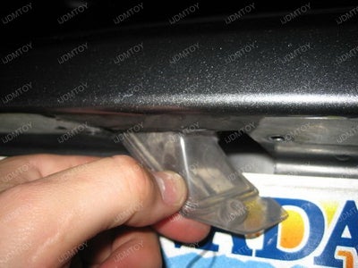 Remove the Stock License Plate Light.