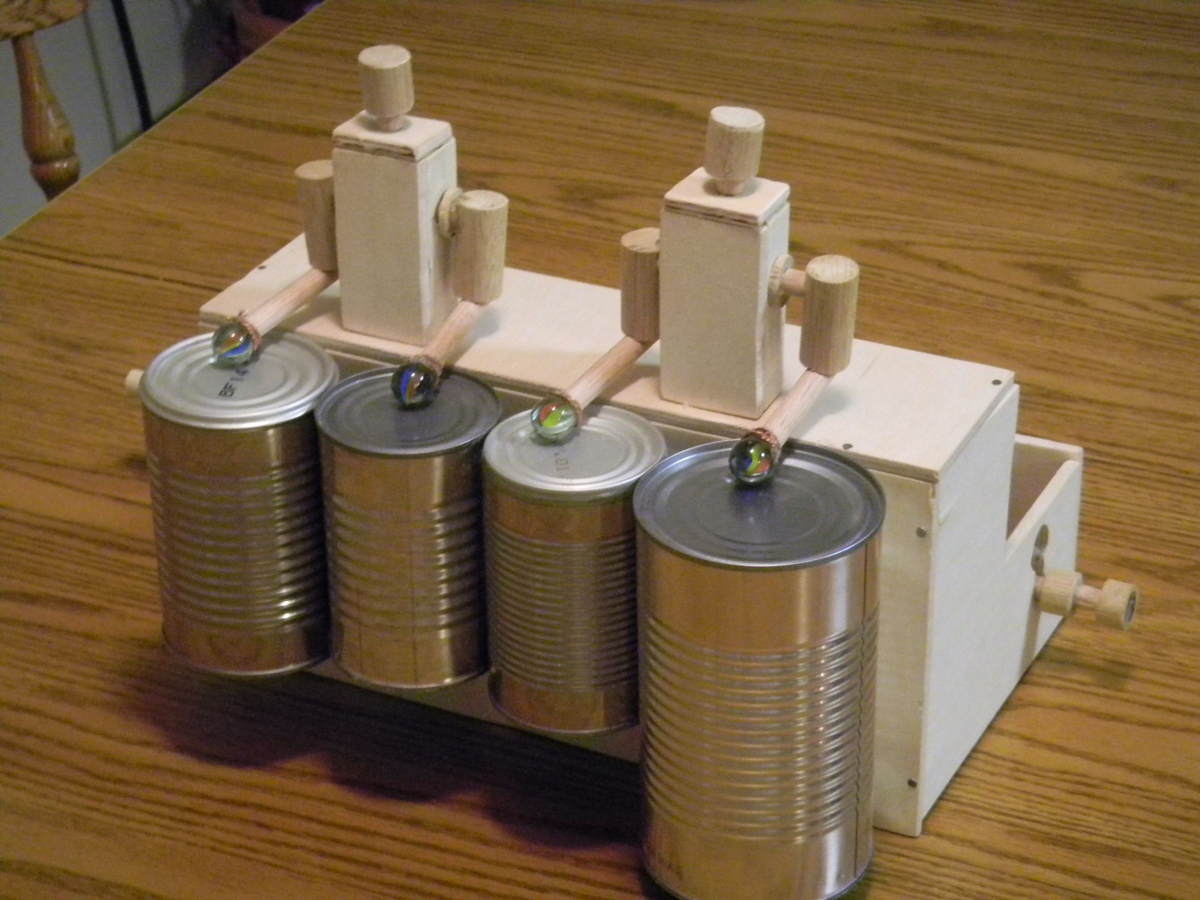 Drumming Men Kinetic Sculpture