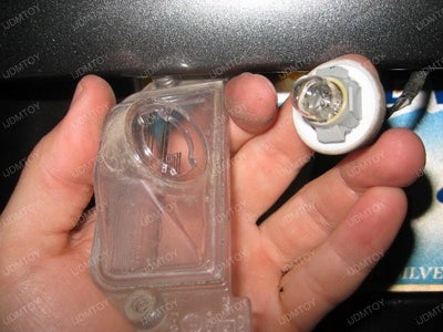 Pull Out the Clear Lens and Incandescent Light Bulb From the Stock Harness.