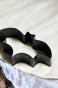 Unroll Thawed Pie Crust and Cut Out Bat Shapes