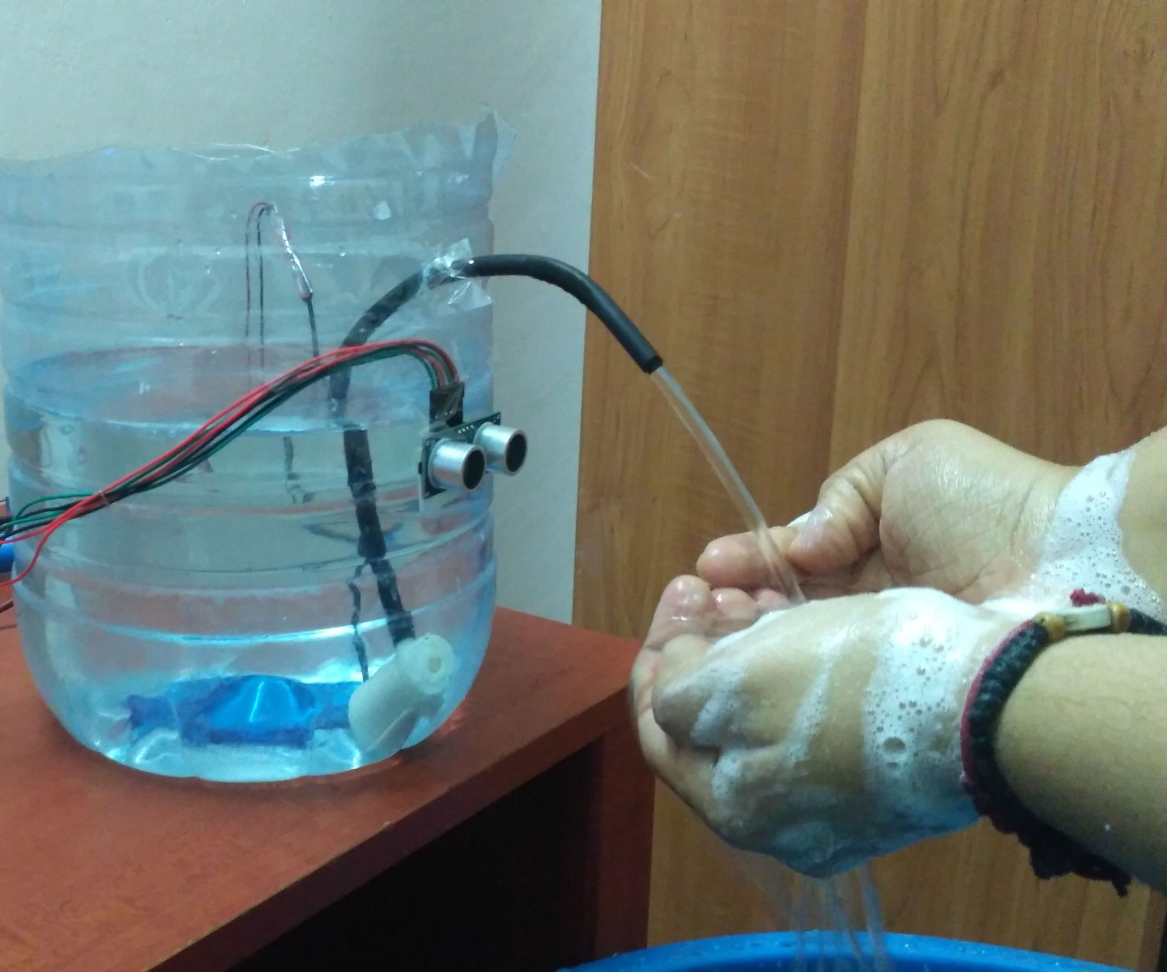 Touchless Faucet With Door Control System for COVID-19