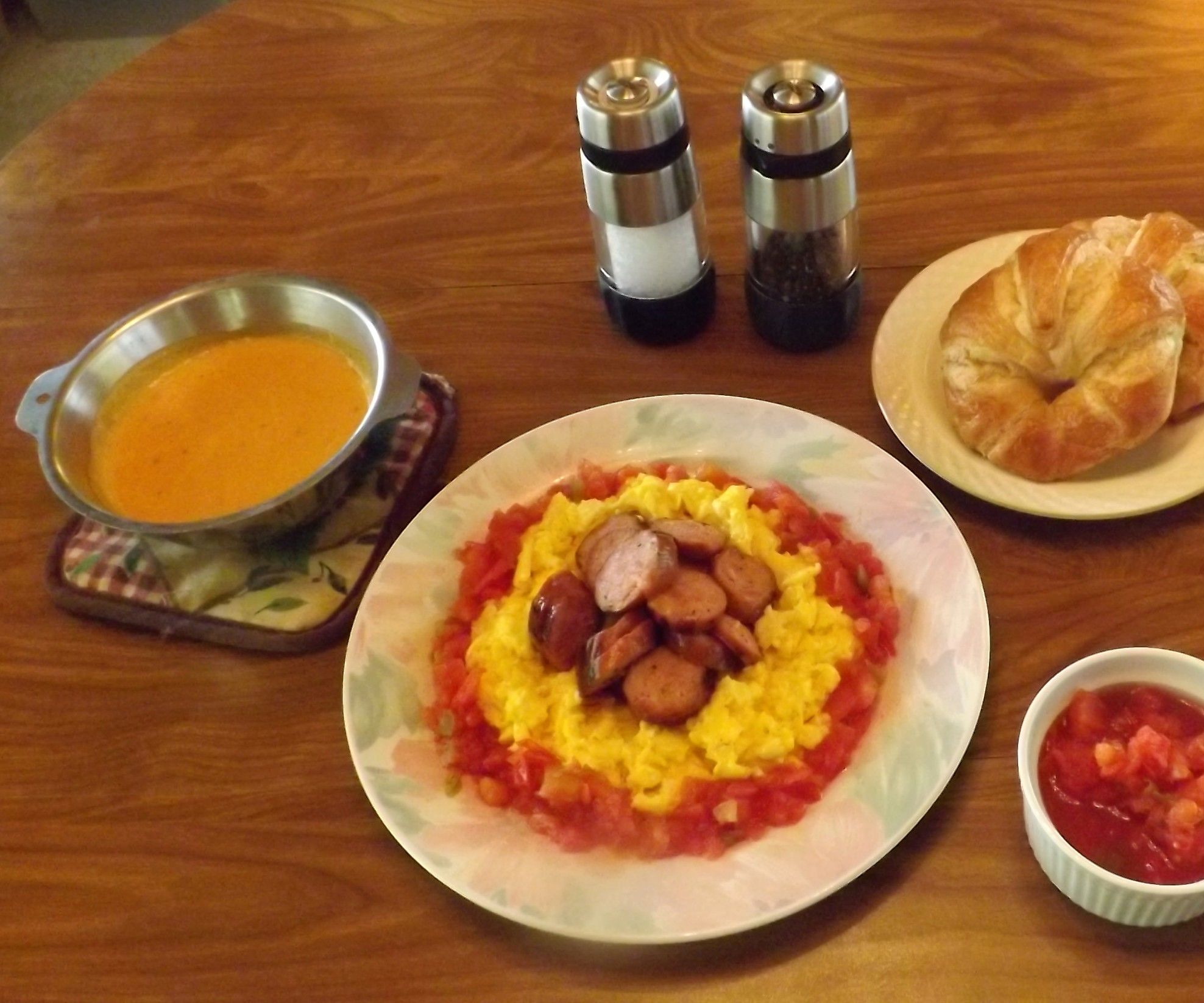 CAJUN SMOKED SAUSAGE & SCRAMBLED EGGS With TOMATOES & CHEESE SAUCE