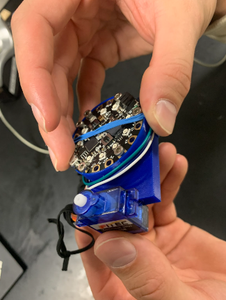 Wrap Wire Around Back of CPX Holder Under the Rubber Band and Up