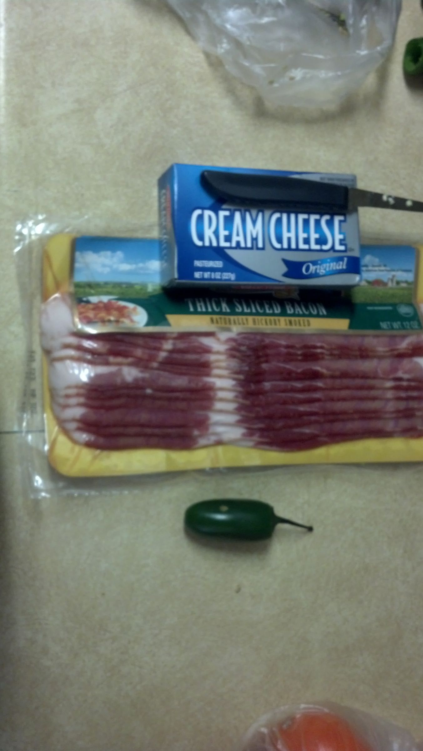 Grilled Mice (Cream Cheese Stuffed Jalapenos Wrapped in Bacon) 7