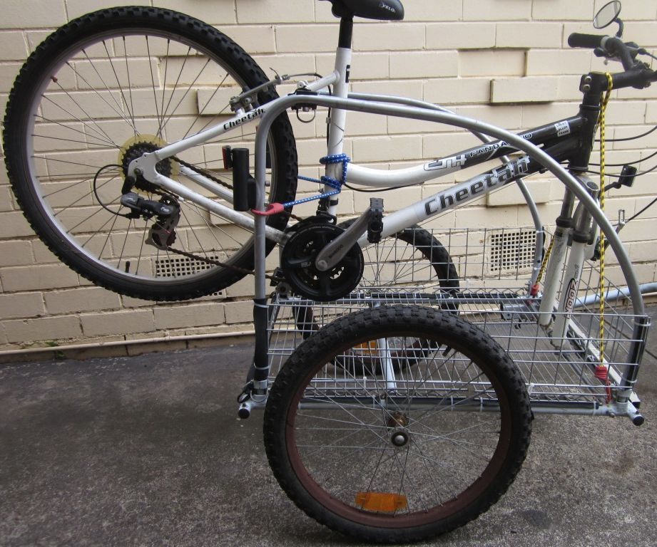 Versatile "carry-a-bike" cargo bike trailer