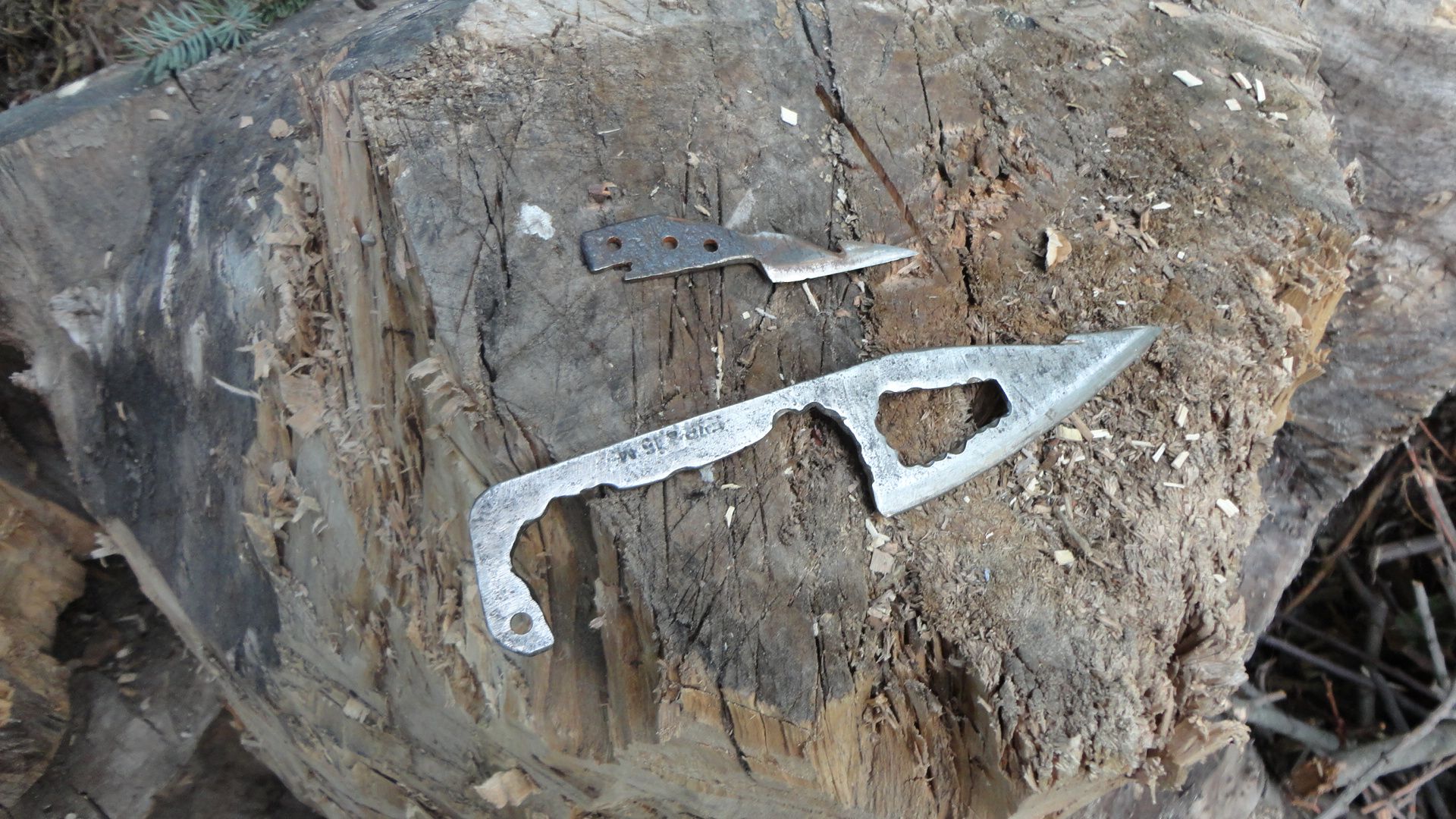 Small Whale Arrowhead and Big Neck Knife, Hole in the Blade