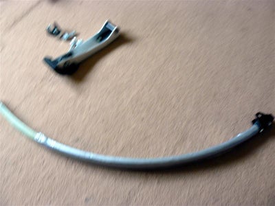 Attaching the Tube and Taping the Spring.