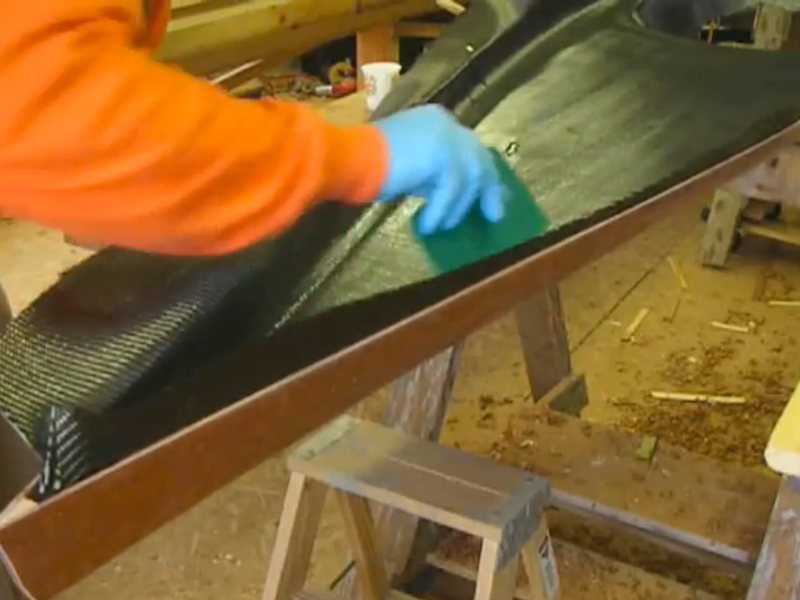 Hand Laying Carbon Fiber Cloth in a Kayak
