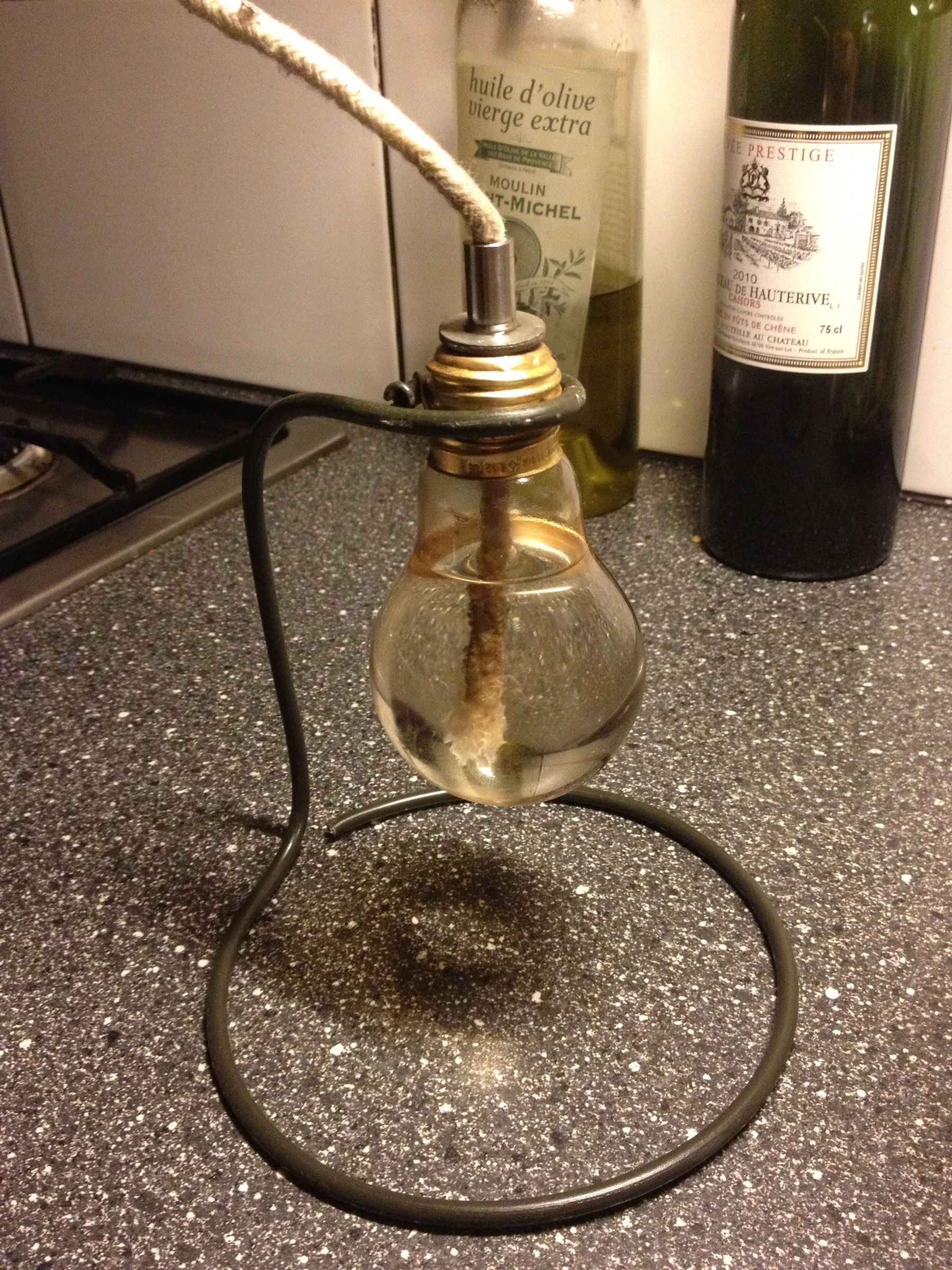 Oil Lamp Out of Brake Lining and a Lightbulb