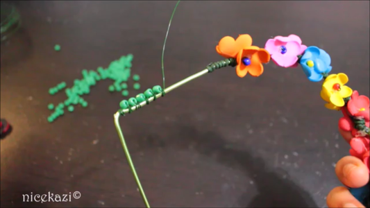 Wrapping the Swing With Flowers and Beads: