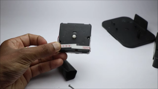 Scavenging Clock Mechanism